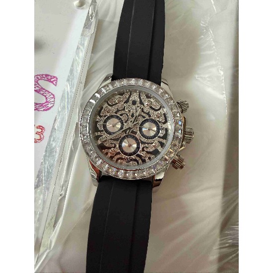 ROLEX     A Cosmograph Daytona RO1999